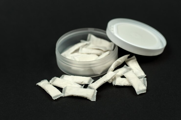 swedish-snus-sachets-open-box-with-snus-black-background_721474-3658.jpg